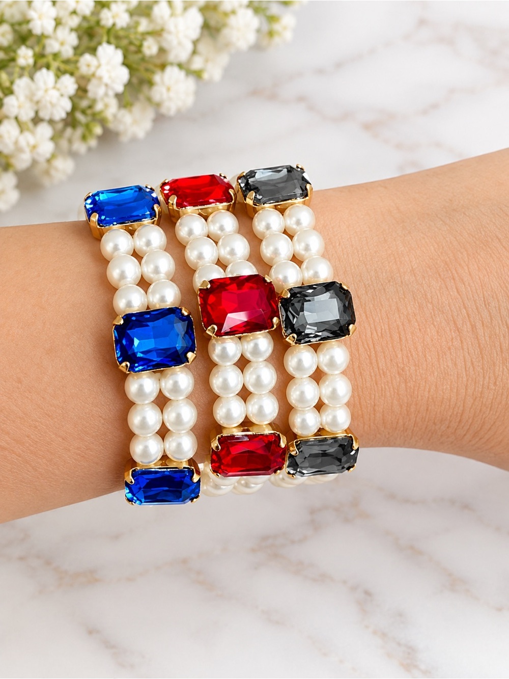 Triple-Row Pearl Stretch Bracelet with Red, Blue and Black Gem Accents